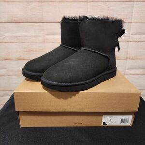 UGG Black Short Shearling Boots with Back Bow